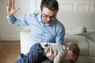A parent about to spank his child