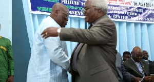 Former Moderator of the Presbyterian Church of Ghana, Prof Emmanuel Martey in an embrace with President Nana Akufo-Addo