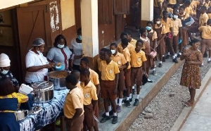 Children being fed in school