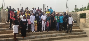 Abrahama Aidoo and the women in a pose after the training