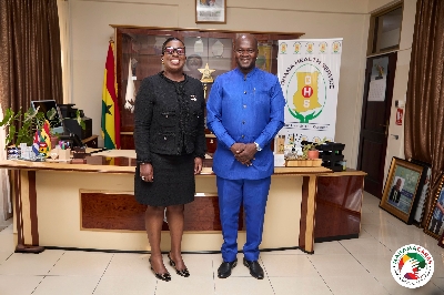 Miss Oboubia Darko Opoku in a pose with  Dr. Samuel Kaba Akoriyea after the meeting