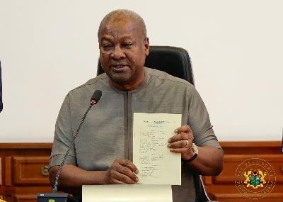 President Mahama assenting the bill