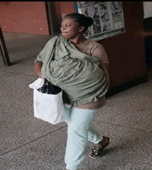 The identified woman leaving the hopital with the stolen baby