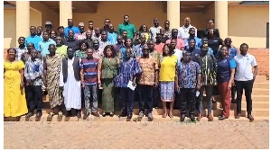 Stakeholders in agroup photograph after the meeting