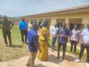 Ralph Poku-Aduse touring the affected areas after rain  caused harvoc