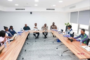 Moses Baiden briefing the complaince team from the Labour Ministry