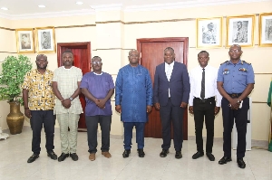 Dr Edward Omane Boamah in a group photopragh with National Cadet Corp