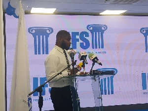 Frederick Amoh delivering the findings of the  survey  in Accra