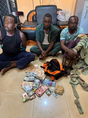 The suspects in police grip