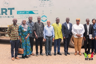 Dr Mary Awusi in a group photograph with management of Entrance Pharmaceuticals in Accra