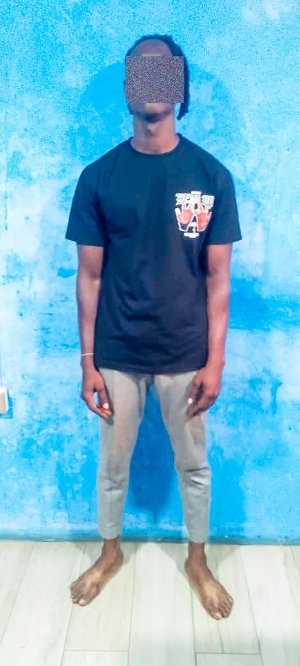 One of the suspects in custody