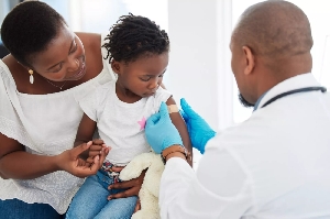 A child being immunized