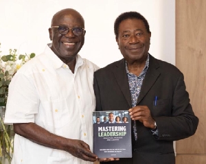 Sir Sam Jinah and Prof Pikay Richardson unveiling the book
