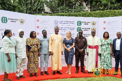 Interior Minister in a group with photograph after the transition in Accra