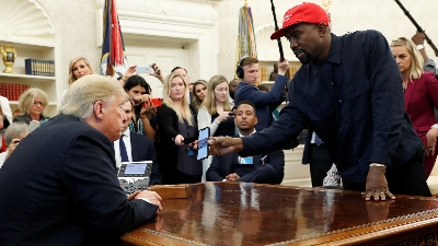 Reuters (Pic): Kanye West speaking to Donald Trump during a 2018 Oval Office meeting