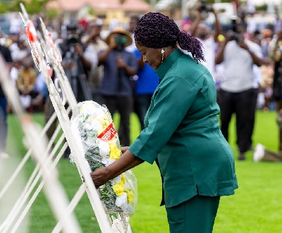 Prof Jane Naana Opoku-Agyemang laying a wreath
