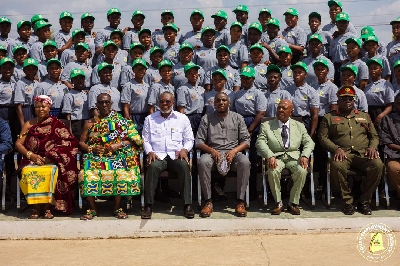 Graduates in a pohotograpph with stakeholders after graduation