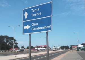 Signboard in Accra showing directions to some key communities