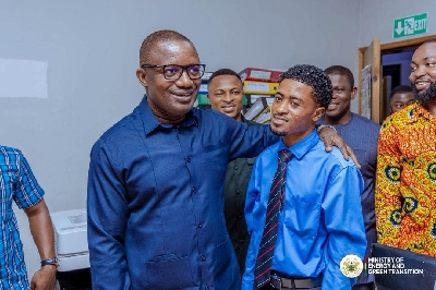 Energy Minister interacting with staff