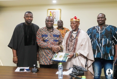 Buipewura shaking hands with Eric Opoku