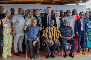 Chef of Staff in a group photograph with participants