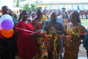 Felix Kwakye Ofosu cutting the tape to unveil the projects