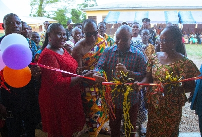 Felix Kwakye Ofosu cutting the tape to unveil the projects