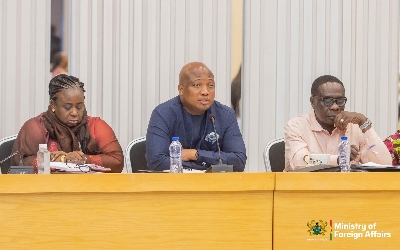 Minister for Foreign Affiars seated with Chief Director and Deputy at the retreat