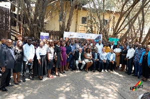 GIPC boss in a group photo with participants