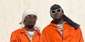 L-R: Shatta Wale and Medikal dressed as inmates