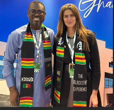 Gilbert Abeiku Aggrey in a pose with a participant in Johannisberg