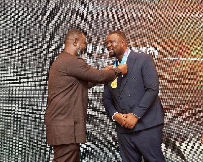 DVLA boss receiving his latest award