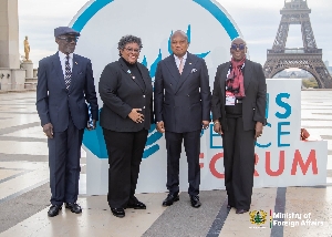 Samuel Okudzeto-Ablakwa in a  pose with Barbados Prime Minister