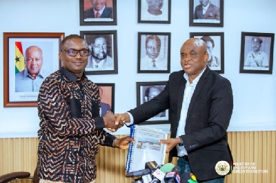 Energy Minister receiving the report