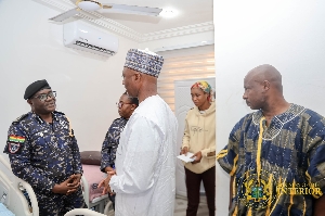 Interior Miniter visit shot police offiecer