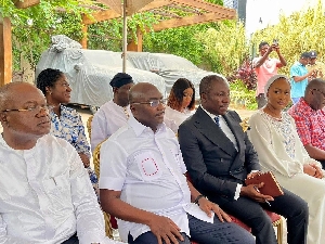 Afenyo Markin seated with Dr Bawumia