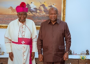 Most Reverend Philip Naameh, Catholic Metropolitan Archbishop of Tamale (L) and President John Mahama (R)