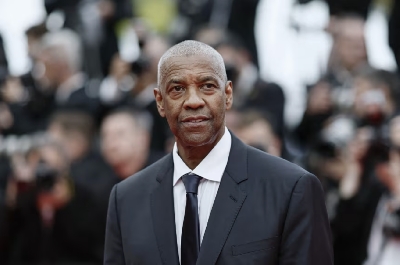 Benoit Tessier/Reuters (Pic): Cast member Denzel Washington arriving for the screening of the film