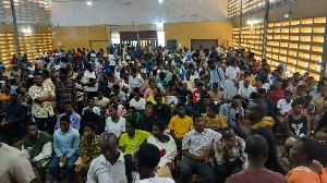 Frustrated students and parents at KTI Assembly Hall