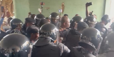 Abronye being whisked away by the police