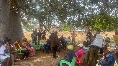 Dr. Mark-Kurt Nawaane interacting with the people after the sod-cutting
