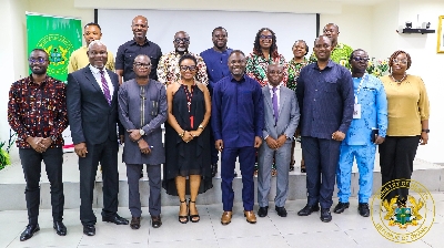 Health Minister in a photo with members of the taskforce