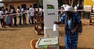 Voter casting her vote