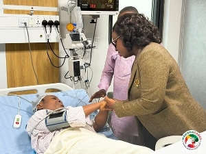 Adwoa Oboubia Darko Opoku having a chat with Rebecca after her surgery