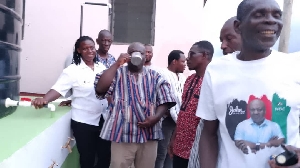 The Member of Parliament (MP) for Agotime Ziope, Charles Agbeve, drinking water
