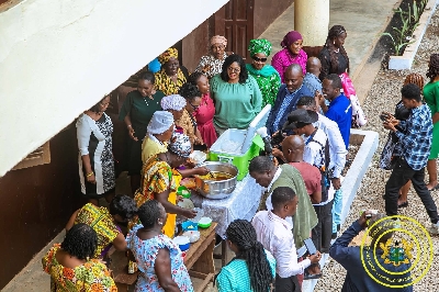 Dr. Agnes Naa Momo Lartey inspecting the food at Weija-Gbawe