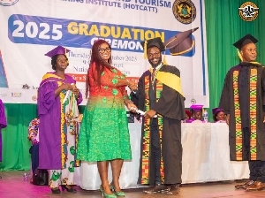 GTA CEO Maame Efua Houadjeto shaking the hand of a HOTCATT graduate