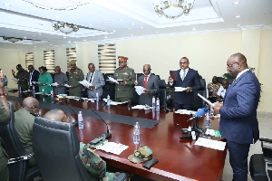 Members of DIHOC board  being swornn-in by Defence Minister