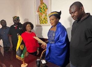 Janet Nabila presenting the petition to Manhyia Palace