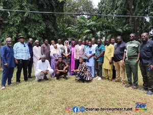 CEO in a pose with Zango Caucus Coordinators